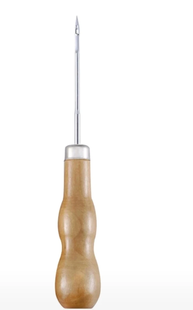 أداة خرم الشمع